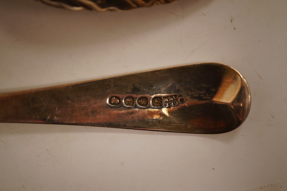 A pair of George III silver Old English pattern berry spoons, by Eley, Fearn & Chawner, London, 1810, 22.1cm, together with three Victorian silver fiddle pattern teaspoons, 6.8oz, together with a pair of plated sugar ton